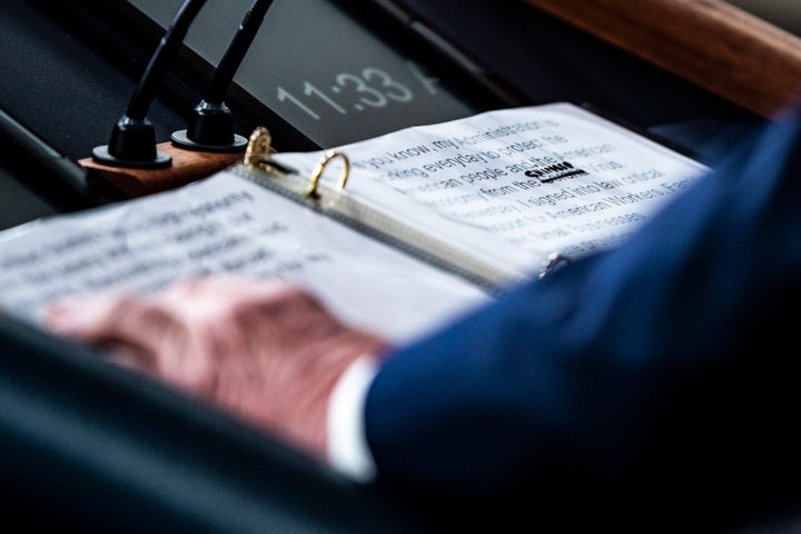 A closeup of Donald Trump's news conference statement Thursday shows where the word "corona" was crossed out and replaced with "Chinese" virus as he speaks to reporters.