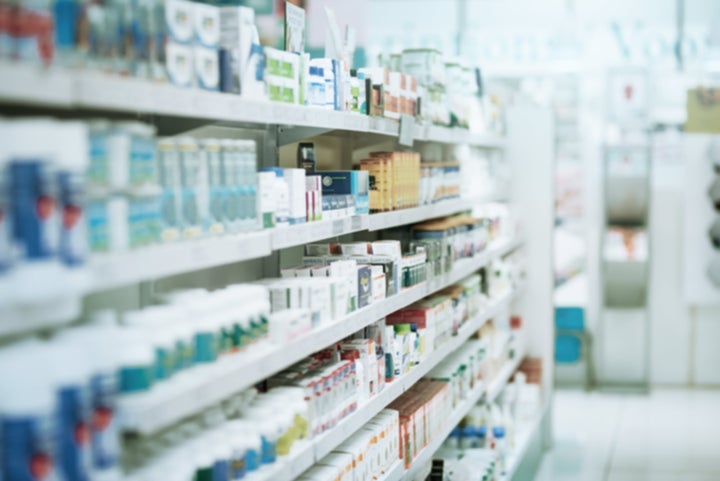 Shot of shelves stocked with various medicinal products in a pharmacy