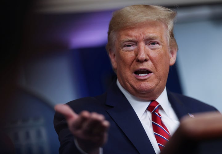 President Donald Trump addresses his administration's daily coronavirus task force briefing at the White House on Friday. 