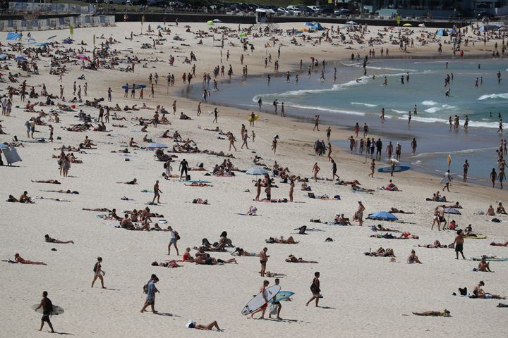 Beachgoers enjoy a sunny day at Bondi Beach despite growing concerns about the spread of the coronavirus disease (COVID-19) in Sydney, Australia, March 20, 2020. REUTERS/Loren Elliott