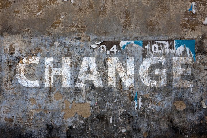 old facade with the word "Change" on it