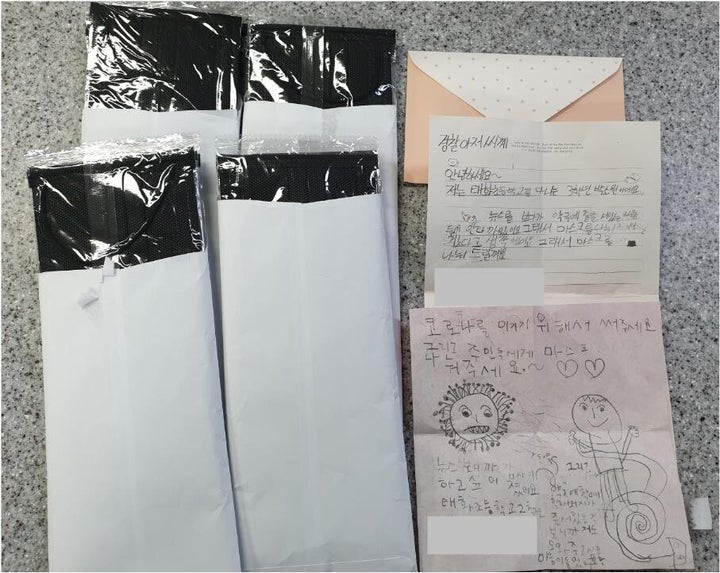 울산 중구 태화지구대에 전달된 초등학생 남매의 손편지와 마스크18장