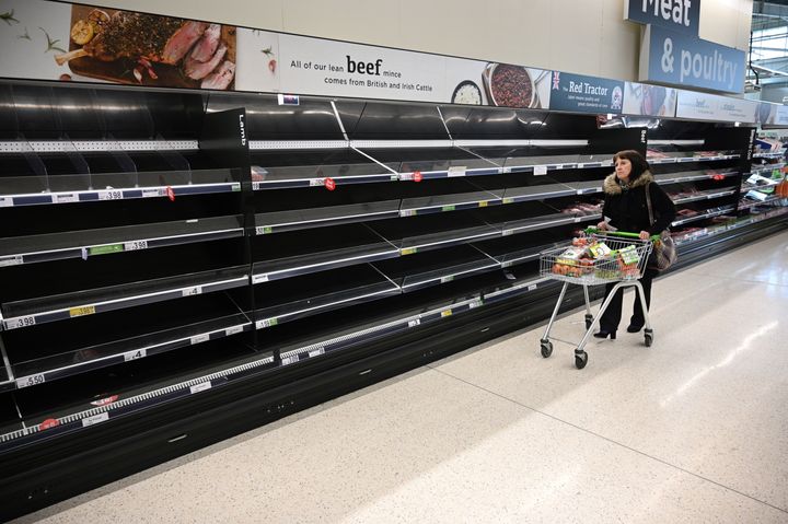 Huge queues and empty shelves have become a symbol of the outbreak. 
