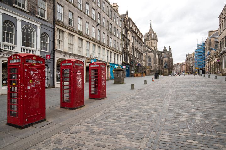 Edinburgh's Royal Mile on the first day after Prime Minister Boris Johnson ordered pubs and restaurants across the country to close as the Government announced unprecedented measures to cover the wages of workers who would otherwise lose their jobs due to the coronavirus outbreak.. (Photo by Jane Barlow/PA Images via Getty Images)