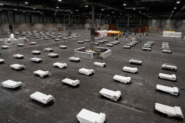 Beds for COVID-19 patients are placed at IFEMA convention center in Madrid.