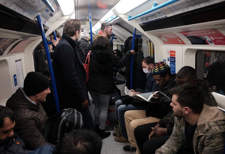 A packed carriage full of passengers travelling on the Victoria line of the London Underground Tube network on Friday