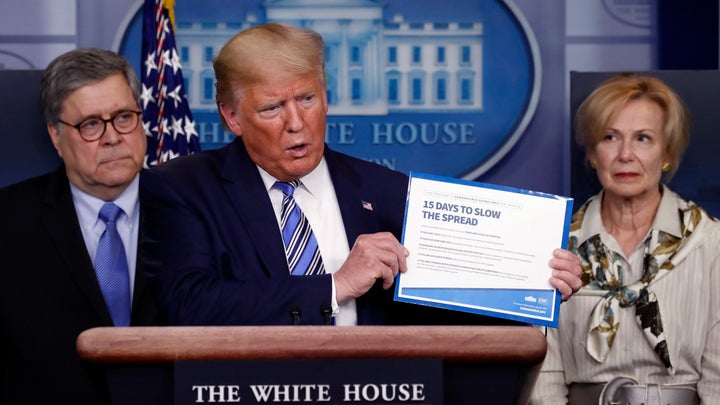 President Donald Trump speaks about the coronavirus as Attorney General William Barr and Dr. Deborah Birx, the White House coronavirus response coordinator, listen.