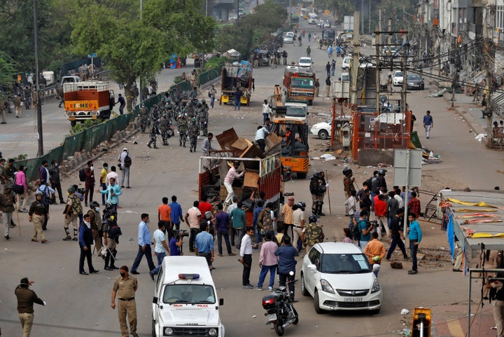 Police clear the site of protest in Shaheen Bagh area of New Delhi, March 24, 2020.