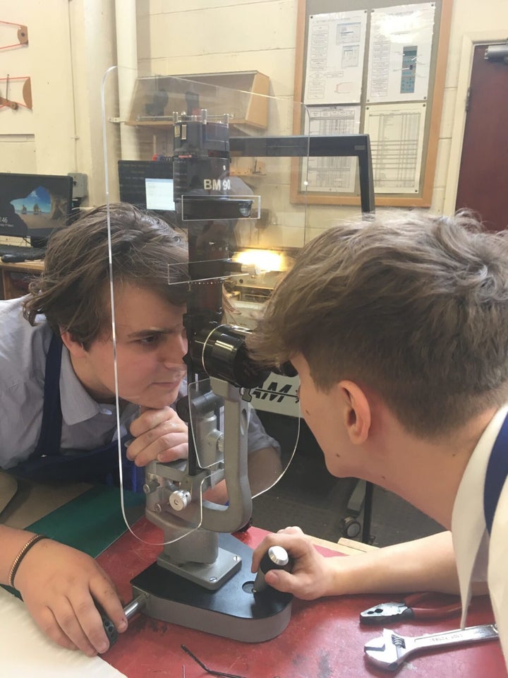 Trent College students making PPE for their local hospital before it shut and social distancing rules were introduced across the UK