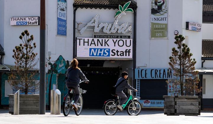 A message thanking the National Health Service staff is shown on a screen at Bournemouth Pier.