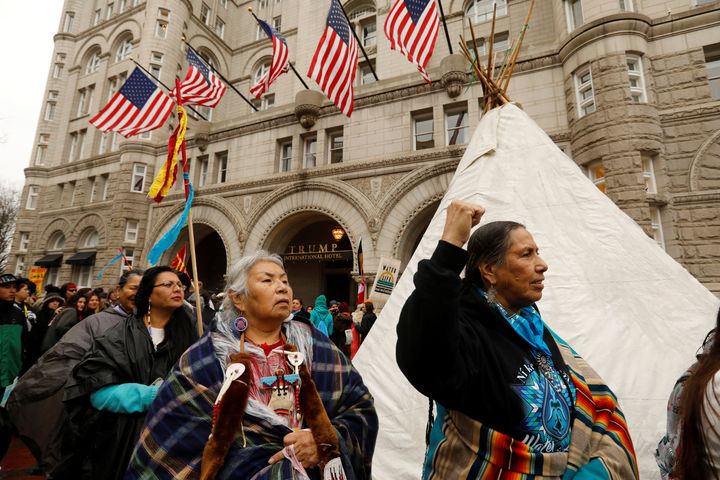 Indigenous leaders participate in a protest march and rally in opposition to the Dakota Access and Keystone XL pipelines, in front of the Trump International Hotel in Washington, U.S., March 10, 2017. 