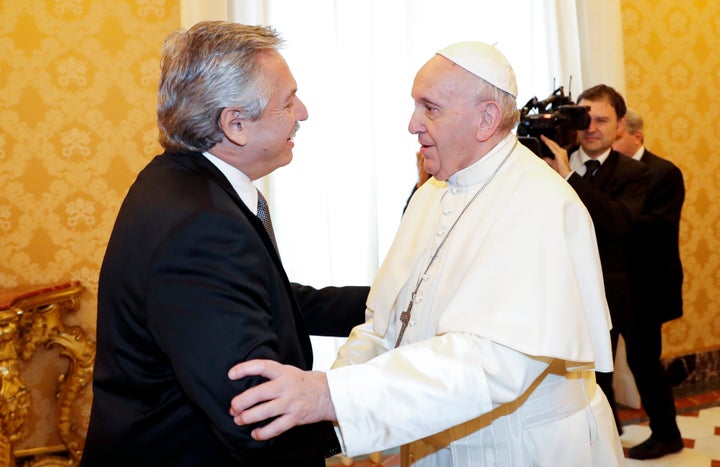 Pope Francis welcomes Argentina's President Alberto Fernández, left, during a private audience at the Vatican on Jan. 31, 2020.