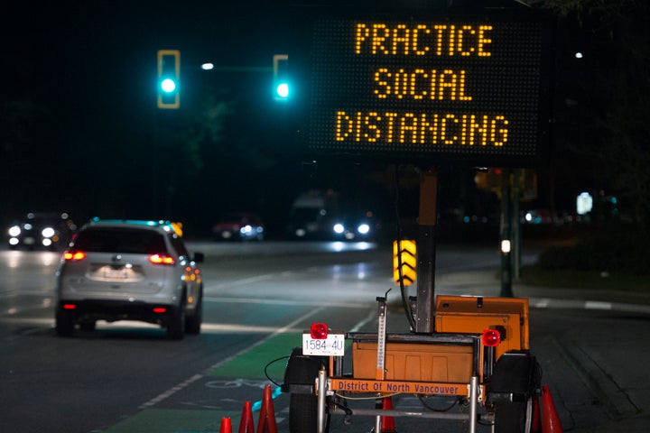 A highway sign reminding people about "social distancing" in the midst of the COVID-19 coronavirus outbreak.