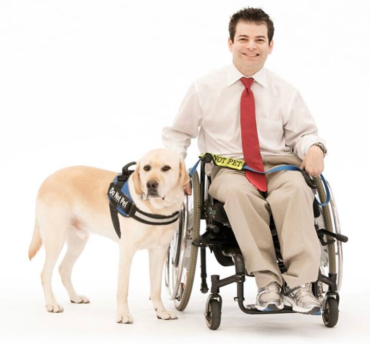 Ryan Honick and his service dog, Pico. Social distancing measures can make basic tasks, such as grocery shopping, more difficult or impossible for some people with disabilities.