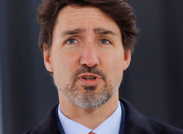 Canada's Prime Minister Justin Trudeau speaks to news media outside his home in Ottawa, Ontario, Canada March 25, 2020. REUTERS/Patrick Doyle