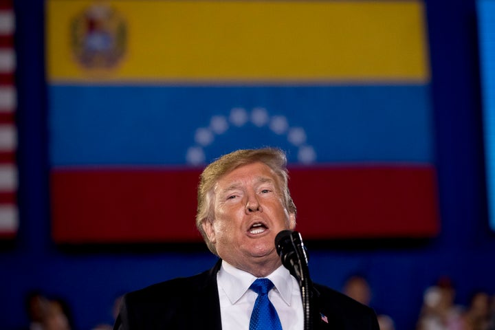 President Donald Trump addresses the Venezuelan American community at Florida International University in Miami to speak out against Venezuelan President Nicolás Maduro's government and its socialist policies.