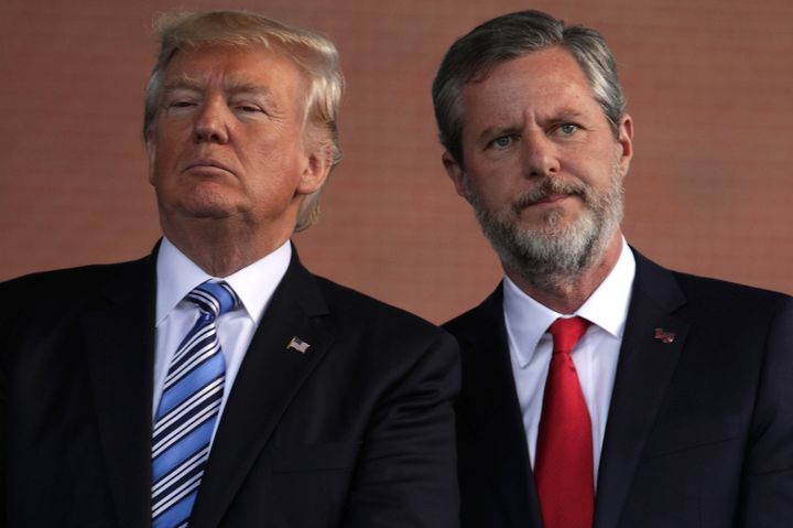 U.S. President Donald Trump (left) and Jerry Falwell (right), president of Liberty University, on stage during a commencement at Liberty University, May 13, 2017, in Lynchburg, Virginia.