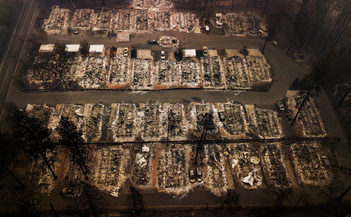 An aerial file photo taken in 2018 shows the remains of residences leveled by the Camp Fire in Paradise, Calif. 