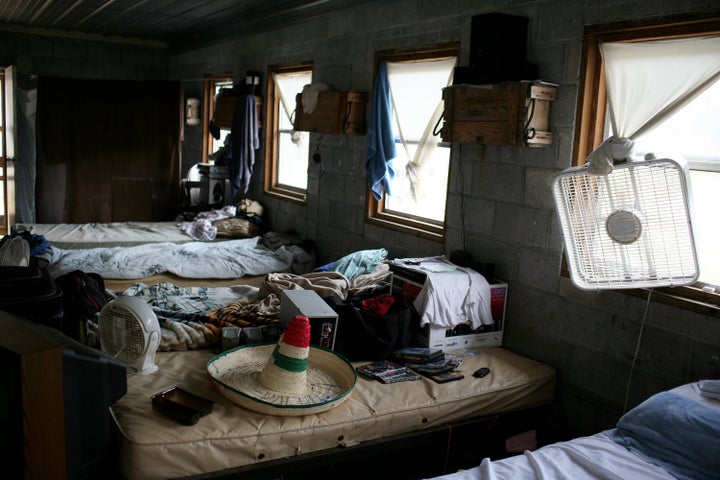 A migrant farmworkers' dorm room in central North Carolina. (Photo by Andrew Lichtenstein/Corbis via Getty Images)