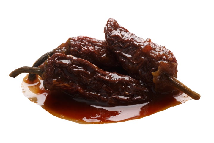 Chipotles in adobo are whole smoke-dried jalapeno peppers in seasoning.