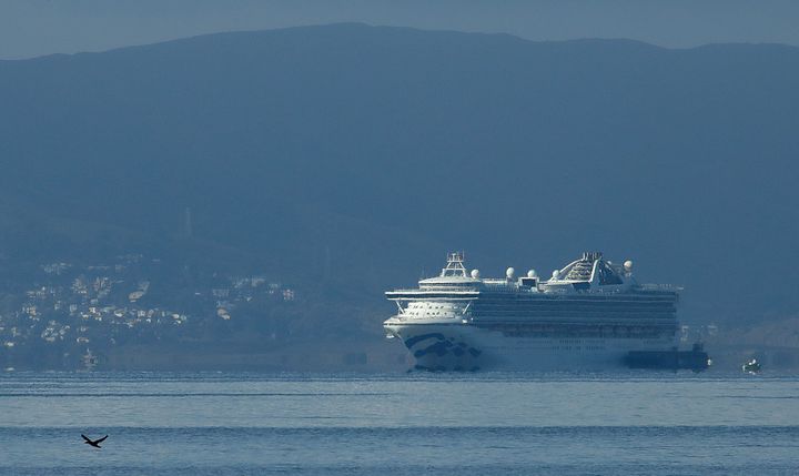 The Grand Princess plies the waters of San Francisco Bay. The ship docked in Oakland on March 9 with passengers and crew members who tested positive for coronavirus.