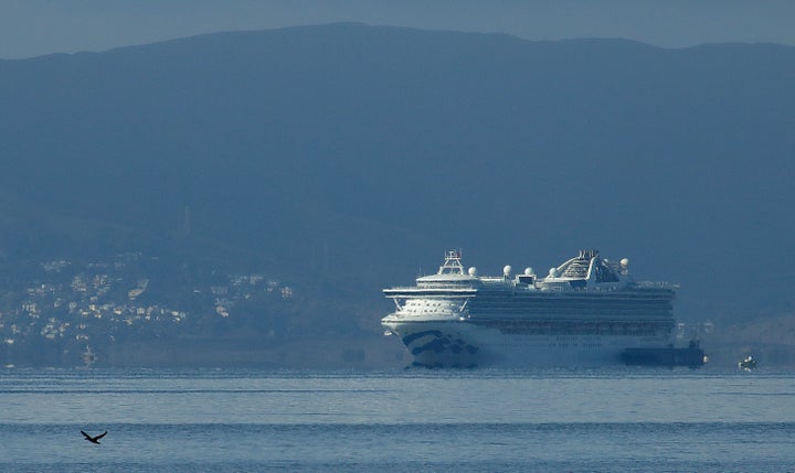 The Grand Princess plies the waters of San Francisco Bay. The ship docked in Oakland on March 9 with passengers and crew memb