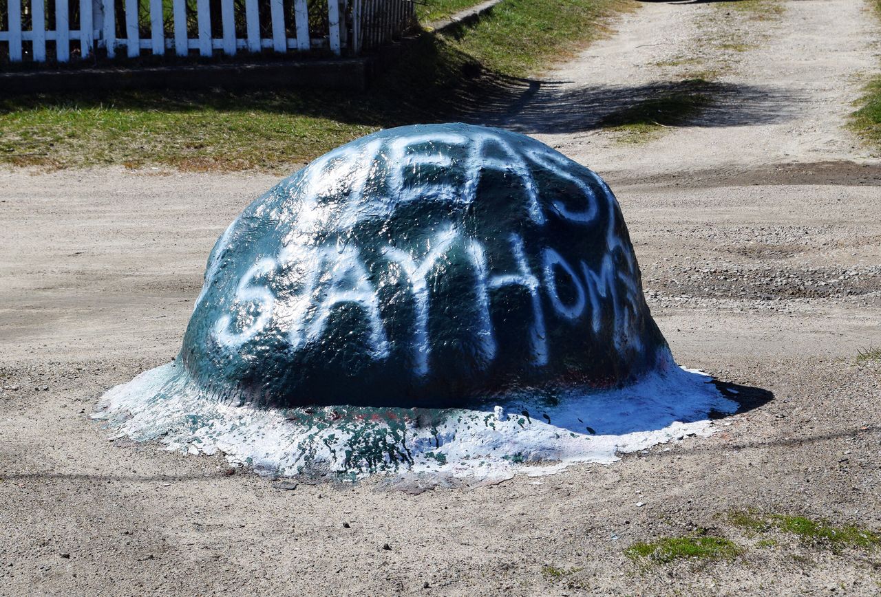 A rock painted with the message "Please Stay Home" in New Shoreham, Rhode Island, on March 26.