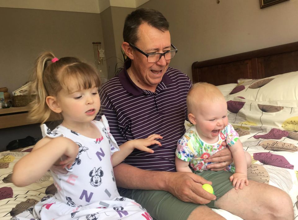 Graham Sabino enjoying retirement with his grandchildren