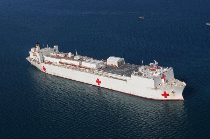 In this Jan. 20, 2010, file photo, the Military Sealift Command hospital ship USNS Comfort is anchored off the coast of Haiti