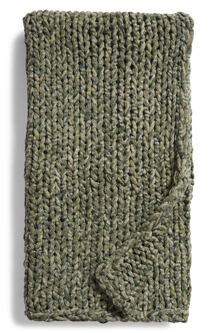 Space-dyed yarns give this soft and cozy knit throw blanket a gorgeous depth.