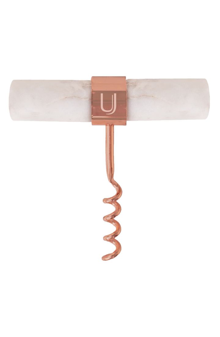 Uncork your favorite bottle with this marble-and-copper corkscrew that adds a luxe touch to your bar accessories.