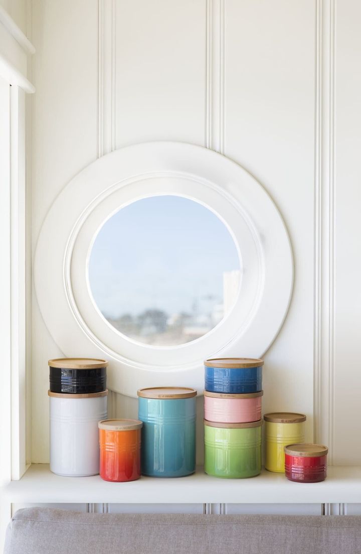 An attractive storage canister—topped with a tight-sealing beechwood lid that makes it easy to stack—is made from dense stoneware that helps regulate the temperature of the contents while blocking moisture and keeping contents fresh.