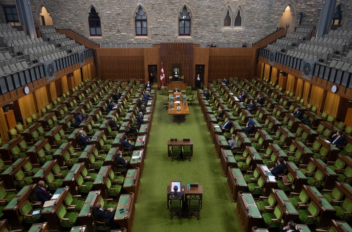 Members of the House of Commons attend an emergency sitting on March 24, 2020 in Ottawa. 