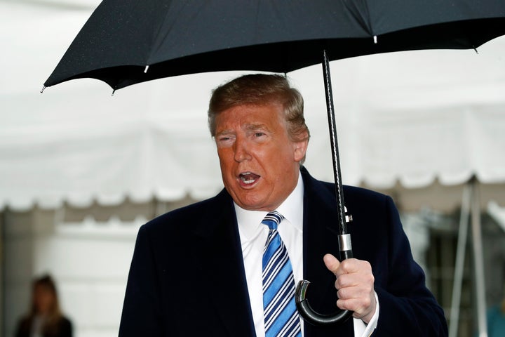 President Donald Trump speaks about the coronavirus as he walks to Marine One to depart the White House on Saturday.