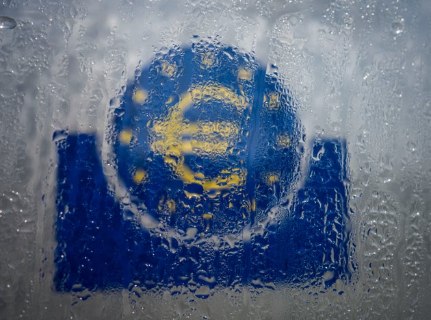 19 March 2020, Hessen, Frankfurt/Main: Water has settled in the glass welcome sign with a euro symbol at the southern entrance to the headquarters of the European Central Bank (ECB). In the fight against the consequences of the coronavirus crisis, the European Central Bank (ECB) has made 115 billion euros available to the banks in the euro zone in a long-term refinancing transaction. Photo: Frank Rumpenhorst/dpa (Photo by Frank Rumpenhorst/picture alliance via Getty Images)