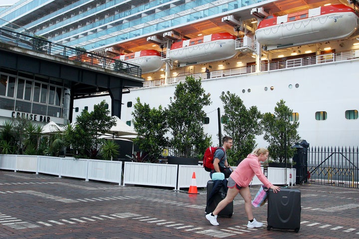 Passengers disembark from the Ruby Princess at Overseas Passenger Terminal on February 08, 2020 in Sydney, Australia.