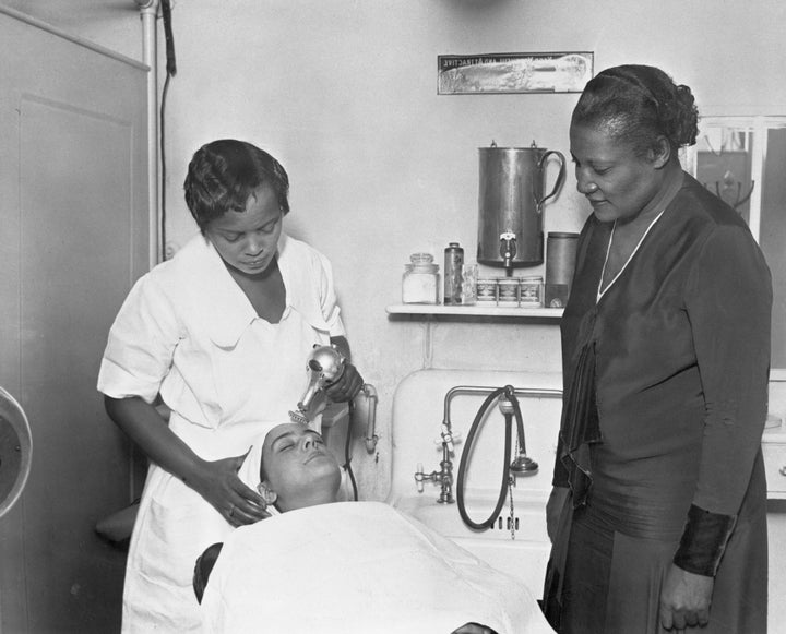 Harlem, New York: A'Lelia Walker is shown supervising a facial in one of Madam C.J. Walker's many beauty parlors.
