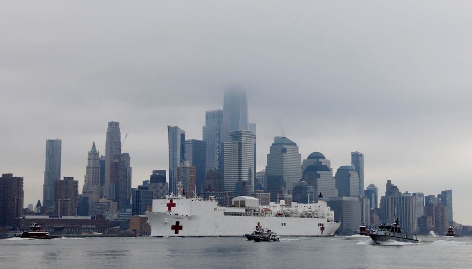 The USNS Comfort passes Manhattan as it enters New York Harbour on Monday.