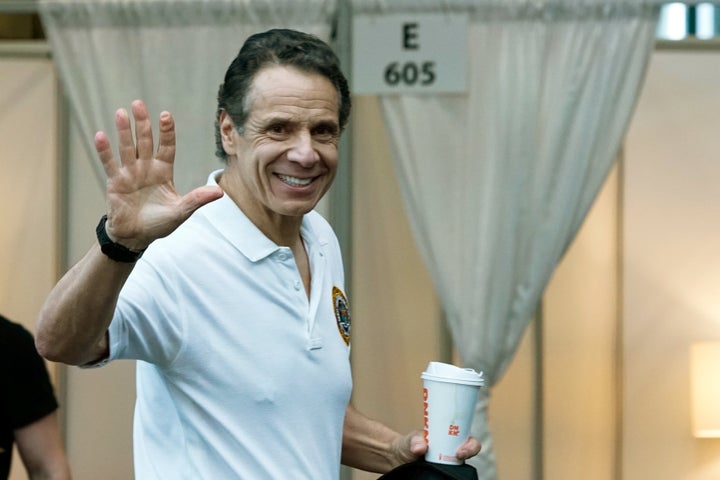 New York Gov. Andrew Cuomo (D) waves on Friday after he gave what has become daily briefings on the state's battle against the coronavirus pandemic. His Friday briefing took place at the Jacob K. Javits Convention Center, which is being turned into a hospital.