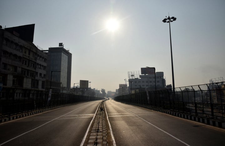 A view of deserted road in Guwahati city during Assam Bandh called by All Assam Students' Union (AASU) and Northeast Students organisation (NESO) against the Citizenship (Amendment) Bill, 2016.