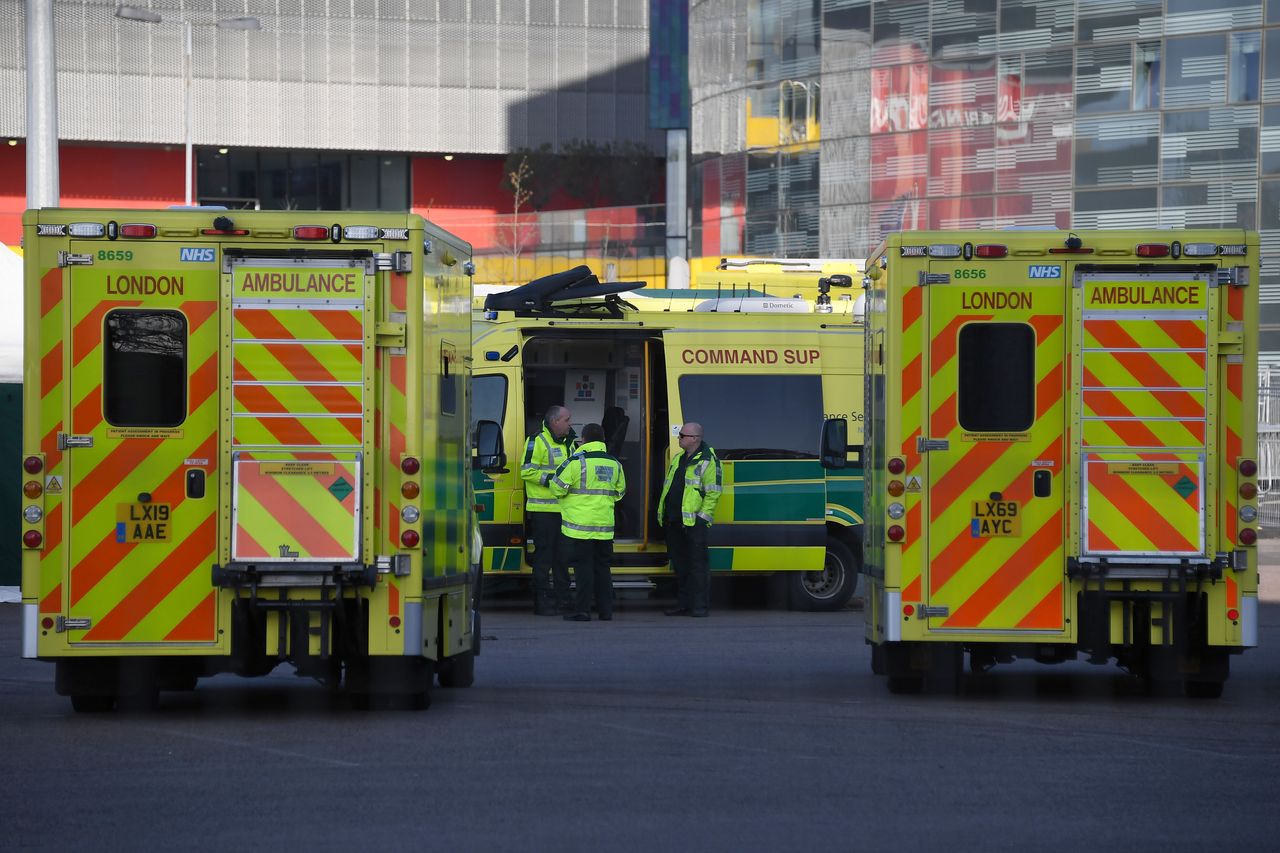 Ambulances outside the ExCel Centre, which is being turned into a 4000 bed temporary hospital for coronavirus patients in London