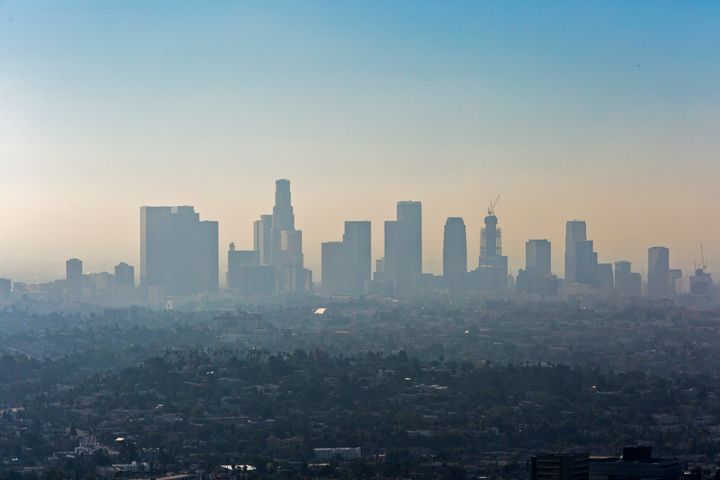 Downtown Los Angeles with a layer of smog. Levels of pollution in the city have dropped, but experts say it's only temporary.