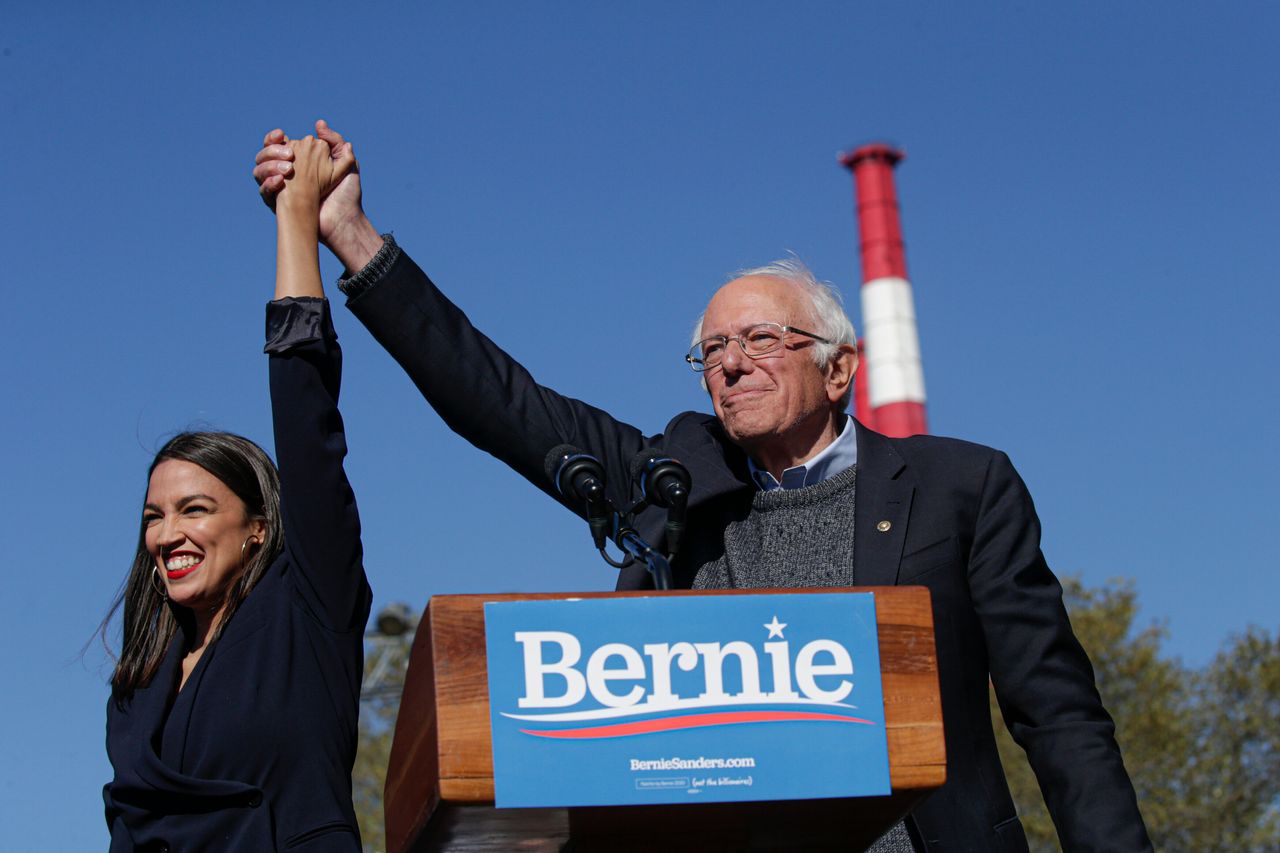Rep. Alexandria Ocasio-Cortez (D-N.Y.), left, endorsed Sanders at a rally in Queens on Oct. 19. Her support sparked a comeback for Sanders who suffered a heart attack weeks earlier.