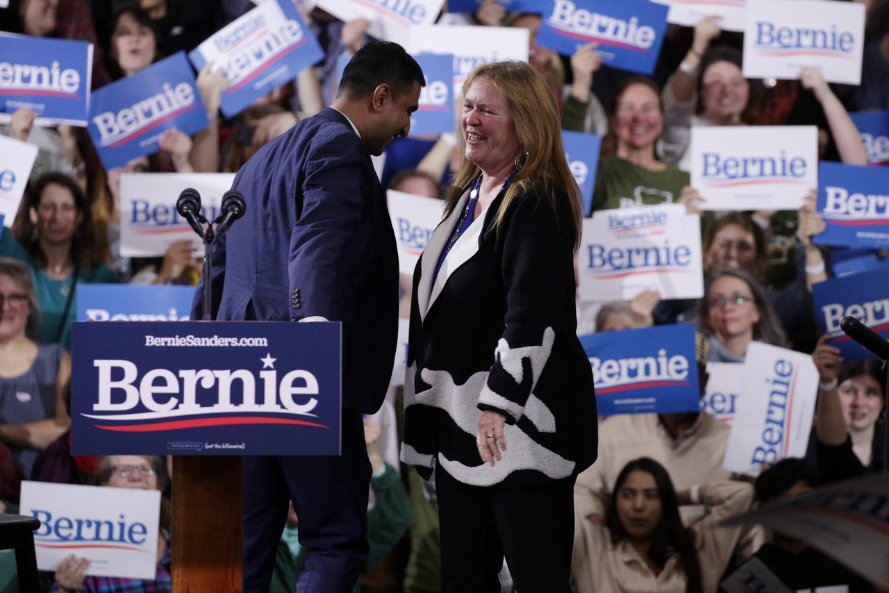 Sanders campaign manager Faiz Shakir greets Jane Sanders at a March 3 rally. Shakir's critics believe his decision to regularly travel with the candidate hurt the campaign.