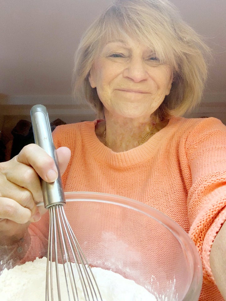 Jennifer's mother, Michèle, learning to make a banana yogurt loaf at home, in Paris, instructed via video chat by her daughter in Toronto.