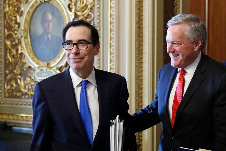 Treasury Secretary Steve Mnuchin, left, and White House chief of staff Mark Meadows step out of a meeting as the Senate negotiated a coronavirus relief bill in March.