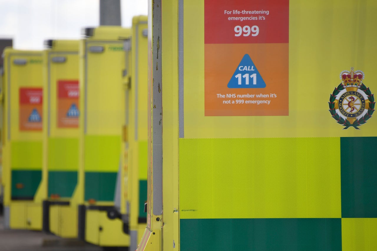 Ambulances lined up outside the ExCel centre that is being turned into a temporary 4000 bed hospital known as NHS Nightingale