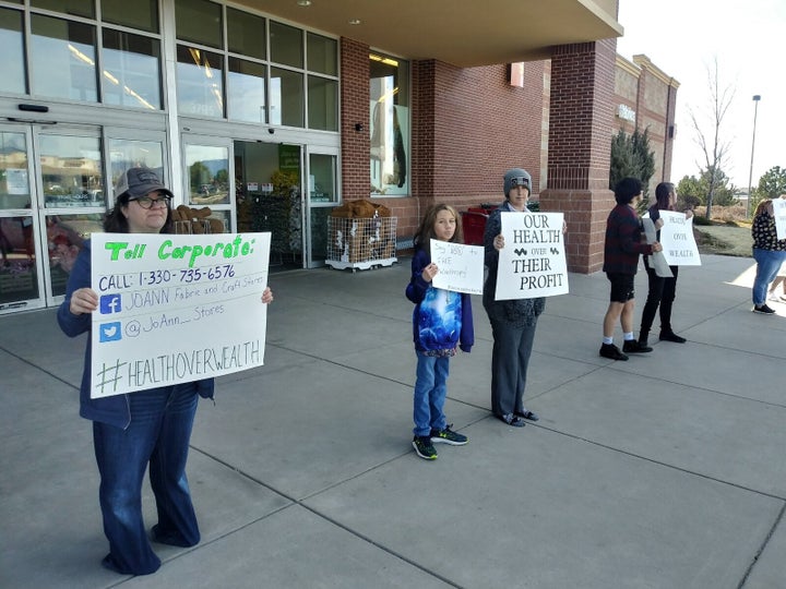 Workers and supporters outside a JoAnn's Fabrics and Crafts store in Colorado Springs last week. Jessica DeFronzo is third from the left.