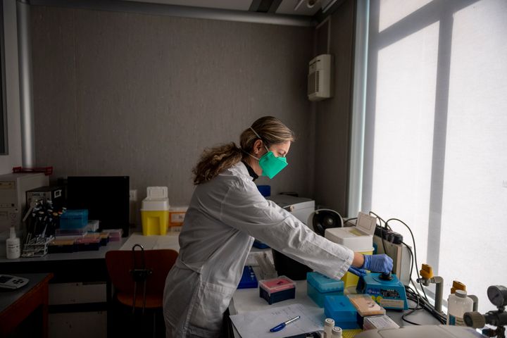 An Italian army doctor works at the chemical analysis laboratory of the scientific department at Celio Military Polyclinic Hospital in Rome on Wednesday.