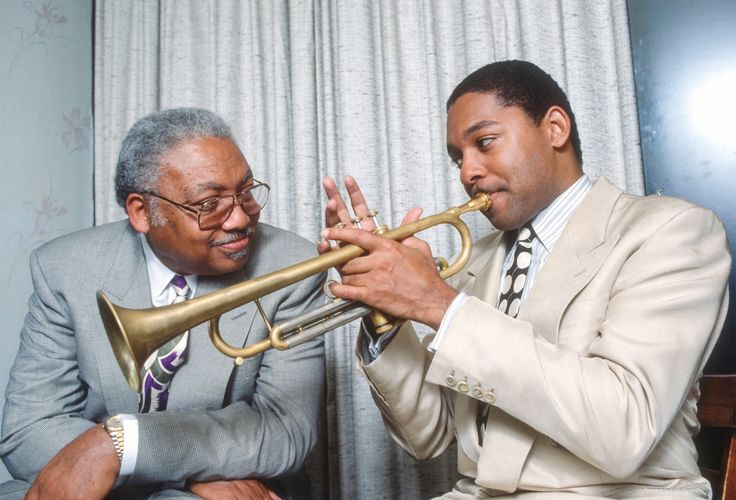 Ellis Marsalis Jr. (left) and his son, fellow musician Wynton Marsalis, backstage after a rare performance as a duo at The Blue Note nightclub in New York in 1990.